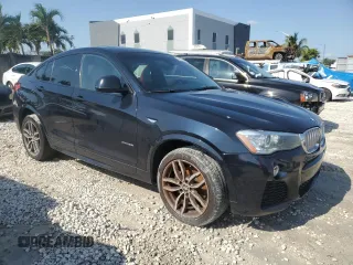2017 BMW X4 xDrive28i with VIN 5UXXW3C35H0T80399, listed as a Copart auction lot 52573315 with 110,004 mi miles and Clean Title. Bid and sale history available at carsss.com. Image 4.