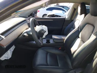 2023 Tesla Model Y Long Range with VIN 7SAYGDEE0PF907260, listed as a IAAI auction lot 41180227 with Not Provided miles and . Bid and sale history available at DreamBid. Image 5.