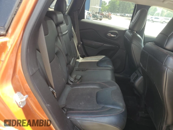 2014 Jeep Cherokee Trailhawk z VIN 1C4PJMBS4EW236608, wystawiony jako Copart lot #63672685 z przebiegiem 132 341 mil mil oraz Szkoda całkowita • Salvage title. Historia ofert i sprzedaży dostępna na DreamBid. Obrazek 11.