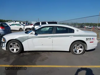 2014 Dodge Charger Police with VIN 2C3CDXAT8EH348719, listed as a IAAI auction lot 42026437 with 140,573 mi miles and . Bid and sale history available at DreamBid. Image 14.