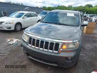 2011 Jeep Grand Cherokee Overland Summit with VIN 1J4RR6GT3BC713812, listed as a IAAI auction lot 42398585 with 208,476 mi miles and . Bid and sale history available at DreamBid. Image 6.
