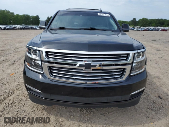 2015 Chevrolet Suburban LTZ with VIN 1GNSKKKC1FR624679, listed as a Copart auction lot 52957365 with 71,194 mi miles and Salvage Title. Bid and sale history available at DreamBid. Image 5.