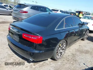 2013 Audi A6 2.0T Premium Plus with VIN WAUDFAFC5DN056383, listed as a IAAI auction lot 42023949 with 128,118 mi miles. Bid and sale history available at carsss.com. Image 4.