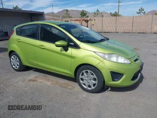 2011 Ford Fiesta SE with VIN 3FADP4EJ8BM157173, listed as a IAAI auction lot 41972892 with 407,227 mi miles. Bid and sale history available at carsss.com. Image 1.