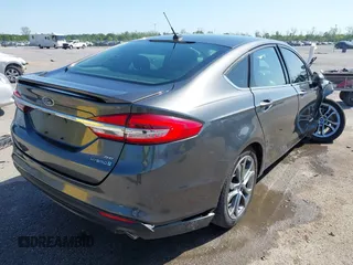 2017 Ford Fusion Hybrid SE with VIN 3FA6P0LU0HR195992, listed as a IAAI auction lot 42007452 with 78,578 mi miles and . Bid and sale history available at DreamBid. Image 4.