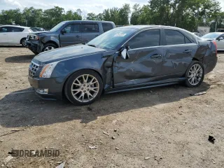 2013 Cadillac CTS Premium with VIN 1G6DP5E34D0151591, listed as a Copart auction lot 63668325 with 59,477 mi miles and Salvage title. Bid and sale history available at DreamBid. Image 1.