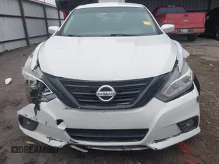 2016 Nissan Altima SR with VIN 1N4AL3AP7GC277879, listed as a IAAI auction lot 41523475 with 128,821 mi miles and . Bid and sale history available at carsss.com. Image 13.