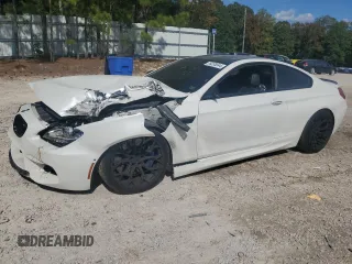 2014 BMW M6 z VIN WBSLX9C51ED160529, wystawiony jako Copart lot #76238844 z przebiegiem 57 557 mil mil oraz Szkody całkowita. Historia ofert i sprzedaży dostępna na DreamBid. Obrazek 1.
