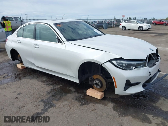 2021 BMW 3 Series 330i z VIN 3MW5R1J08M8C07261, wystawiony jako IAAI lot #41861814 z przebiegiem 87 426 mil mil oraz . Historia ofert i sprzedaży dostępna na DreamBid. Obrazek 1.