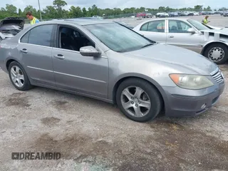 2005 Acura RL z VIN JH4KB16525C003885, wystawiony jako IAAI lot #42524138 z przebiegiem 203 391 mil mil oraz . Historia ofert i sprzedaży dostępna na DreamBid. Obrazek 1.