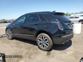 2023 Cadillac XT5 AWD Sport with VIN 1GYKNGRS8PZ100581, listed as a Copart auction lot 55157035 with 14,637 mi miles and Salvage title. Bid and sale history available at DreamBid. Image 2.