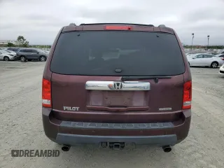 2011 Honda Pilot Touring z VIN 5FNYF3H92BB039165, wystawiony jako Copart lot #59596105 z przebiegiem 182 944 mil mil oraz Szkoda całkowita • Salvage title. Historia ofert i sprzedaży dostępna na DreamBid. Obrazek 6.