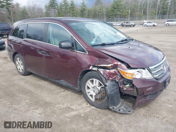2013 Honda Odyssey LX with VIN 5FNRL5H26DB010444, listed as a IAAI auction lot 42039693 with 173,863 mi miles and . Bid and sale history available at carsss.com. Image 1.