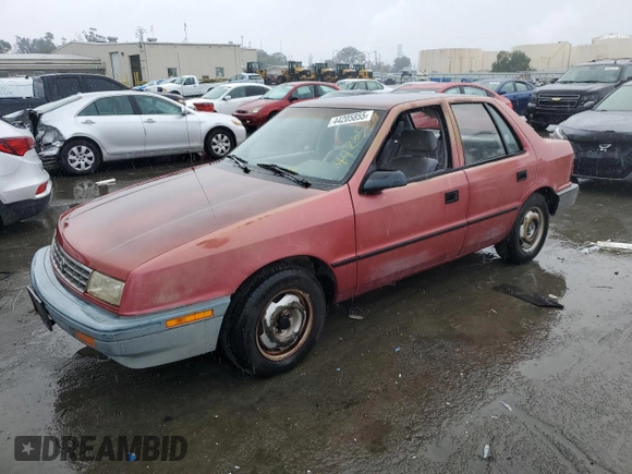 1992 Plymouth Sundance z VIN 1P3XP28D4NN165248, wystawiony jako Copart lot #44205855 z przebiegiem 70 897 mil mil oraz Czysty tytuł • Clean title. Historia ofert i sprzedaży dostępna na DreamBid. Obrazek 1.