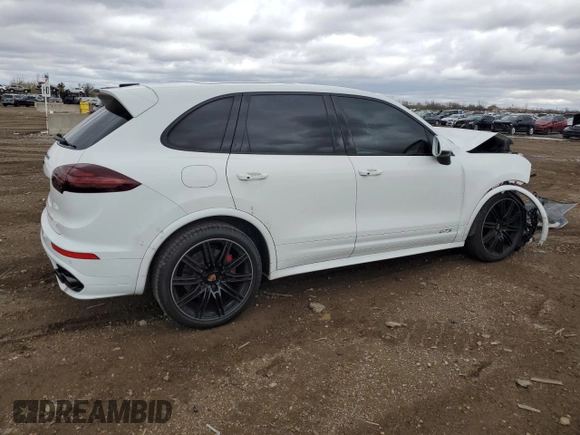 2016 Porsche Cayenne GTS with VIN WP1AD2A27GLA76553, listed as a Copart auction lot 53569615 with 69,761 mi miles and Salvage title. Bid and sale history available at DreamBid. Image 3.