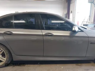 2014 BMW 5 Series 528i xDrive with VIN WBA5A7C5XED613856, listed as a IAAI auction lot 42018901 with 121,783 mi miles and . Bid and sale history available at DreamBid. Image 13.