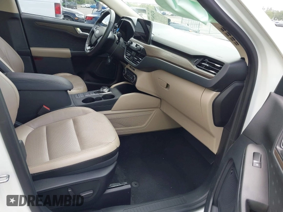 2020 Ford Escape Titanium Hybrid with VIN 1FMCU0DZ3LUC07842, listed as a IAAI auction lot 42456359 with 62,756 mi miles and . Bid and sale history available at DreamBid. Image 5.
