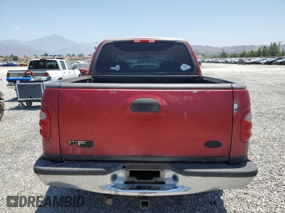 2001 Ford F-150 XLT с VIN 1FTRW07L01KF03457, выставлен на аукционе Copart как лот 60086725 с пробегом 205 917 миль миль и Списание • Salvage title. История ставок и продаж доступна на DreamBid. Изображение 6.