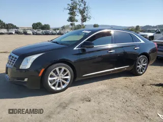 2014 Cadillac XTS Livery z VIN 2G61U5S30E9258998, wystawiony jako Copart lot #60367785 z przebiegiem 290 755 mil mil oraz Czysty tytuł • Clean title. Historia ofert i sprzedaży dostępna na DreamBid. Obrazek 1.