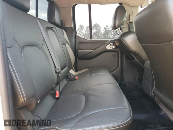 2016 Nissan Frontier Pro-4X with VIN 1N6AD0EV0GN797437, listed as a Copart auction lot 54203245 with 131,021 mi miles and Salvage title. Bid and sale history available at DreamBid. Image 10.