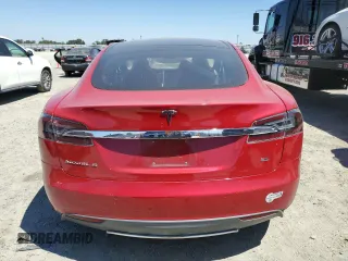 2014 Tesla Model S 60 with VIN 5YJSA1H17EFP64266, listed as a Copart auction lot 61678485 with 104,160 mi miles and Salvage title. Bid and sale history available at DreamBid. Image 6.