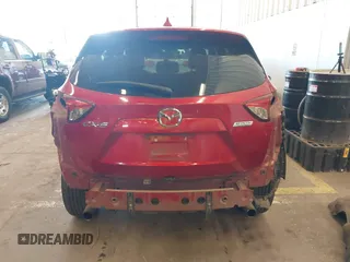 2016 Mazda CX-5 Sport z VIN JM3KE2BY3G0684861, wystawiony jako IAAI lot #42050897 z przebiegiem 165 688 mil mil oraz . Historia ofert i sprzedaży dostępna na DreamBid. Obrazek 18.