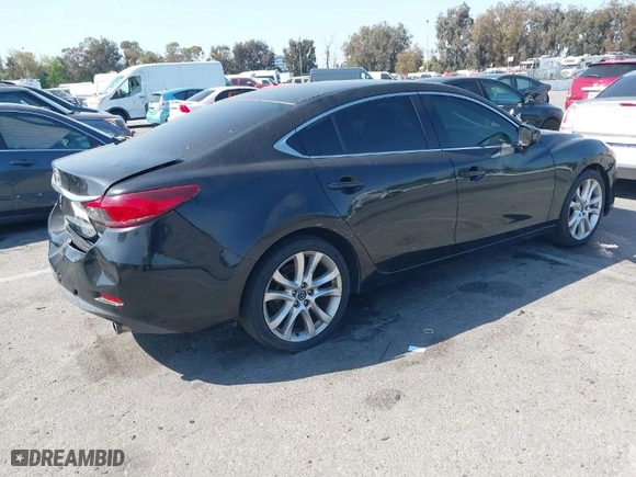 2014 Mazda Mazda6 i Touring with VIN JM1GJ1V69E1155386, listed as a IAAI auction lot 41973800 with 250,808 mi miles. Bid and sale history available at carsss.com. Image 4.