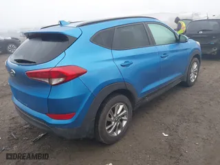 2017 Hyundai Tucson SE Plus with VIN KM8J33A42HU410216, listed as a IAAI auction lot 41337805 with 63,515 mi miles. Bid and sale history available at carsss.com. Image 4.