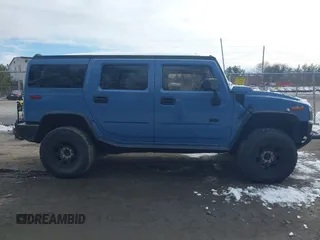 2003 Hummer H2 with VIN 5GRGN23U33H144964, listed as a IAAI auction lot 41621898 with Not Provided miles. Bid and sale history available at carsss.com. Image 13.