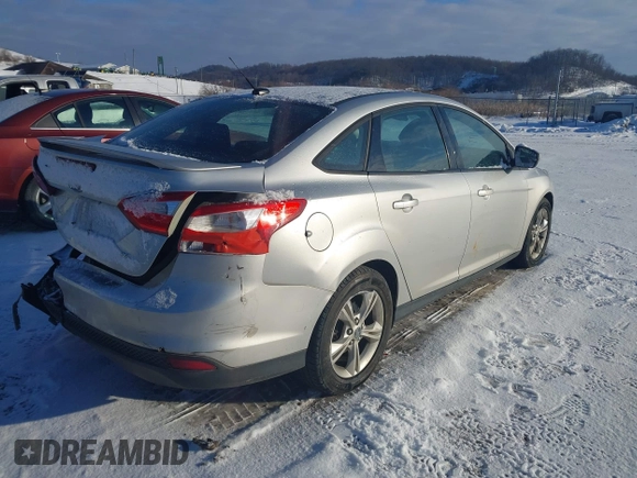 2012 Ford Focus SE with VIN 1FAHP3F27CL457213, listed as a IAAI auction lot 41303904 with 215,044 mi miles and . Bid and sale history available at DreamBid. Image 4.
