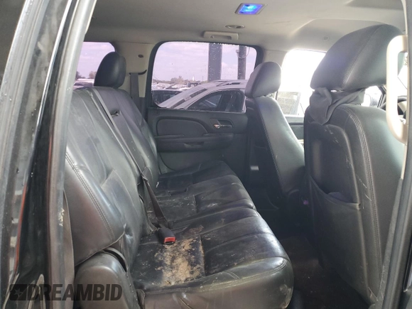 2013 Chevrolet Suburban LT with VIN 1GNSCJE00DR300449, listed as a Copart auction lot 55134455 with 301,552 mi miles and Salvage title. Bid and sale history available at DreamBid. Image 11.