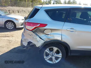 2015 Ford Escape SE with VIN 1FMCU9GXXFUA96774, listed as a IAAI auction lot 42029774 with 78,472 mi miles. Bid and sale history available at carsss.com. Image 6.