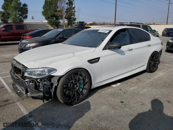 2014 BMW M5 with VIN WBSFV9C56ED097642, listed as a Copart auction lot 87054484 with 77,022 mi miles and Salvage Title. Bid and sale history available at carsss.com. Image 1.