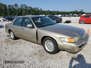 1999 Mercury Grand Marquis LS with VIN 2MEFM75W1XX600671, listed as a Copart auction lot 53323735 with 244,781 mi miles and Salvage Title. Bid and sale history available at DreamBid. Image 4.