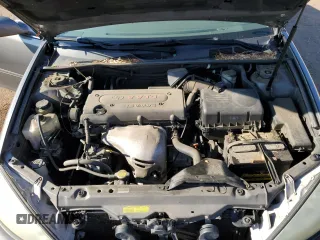 2005 Toyota Camry LE z VIN 4T1BE30KX5U617902, wystawiony jako Copart lot #56540005 z przebiegiem 224 421 mil mil oraz Szkoda całkowita • Salvage title. Historia ofert i sprzedaży dostępna na DreamBid. Obrazek 11.