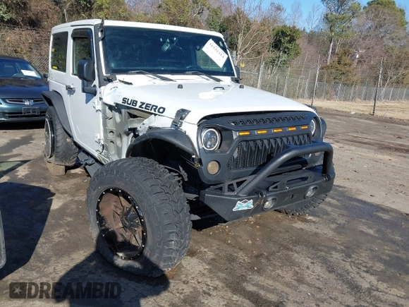 2014 Jeep Wrangler Sport with VIN 1C4AJWAG0EL245337, listed as a IAAI auction lot 41532314 with 140,721 mi miles and . Bid and sale history available at DreamBid. Image 1.