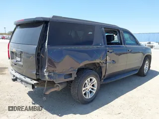 2016 Chevrolet Suburban LT z VIN 1GNSCHKC3GR313126, wystawiony jako IAAI lot #41743640 z przebiegiem 178 351 mil mil oraz . Historia ofert i sprzedaży dostępna na DreamBid. Obrazek 4.