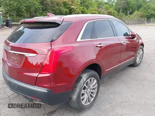 2017 Cadillac XT5 Luxury FWD z VIN 1GYKNBRS1HZ200882, wystawiony jako IAAI lot #42181291 z przebiegiem 95 687 mil mil oraz . Historia ofert i sprzedaży dostępna na DreamBid. Obrazek 4.