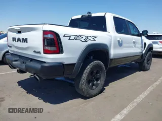 2022 Ram 1500 TRX with VIN 1C6SRFU95NN245954, listed as a IAAI auction lot 42032210 with 30,870 mi miles and . Bid and sale history available at DreamBid. Image 4.