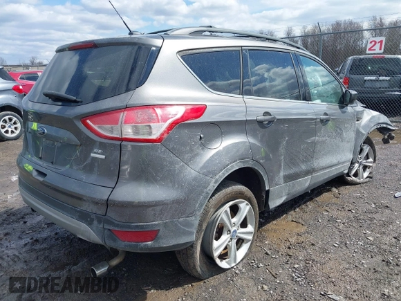 2013 Ford Escape SE with VIN 1FMCU9GX6DUA83081, listed as a IAAI auction lot 41991167 with 106,793 mi miles and . Bid and sale history available at DreamBid. Image 4.