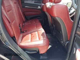 2017 Jeep Grand Cherokee SRT z VIN 1C4RJFDJ8HC653924, wystawiony jako IAAI lot #42108099 z przebiegiem 61 560 mil mil oraz . Historia ofert i sprzedaży dostępna na DreamBid. Obrazek 8.