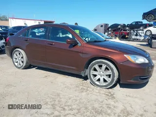 2013 Chrysler 200 Touring with VIN 1C3CCBBB9DN550812, listed as a IAAI auction lot 41677254 with 172,873 mi miles and . Bid and sale history available at carsss.com. Image 1.