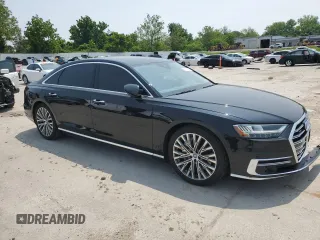 2019 Audi A8 with VIN WAU8DAF82KN020487, listed as a Copart auction lot 60214005 with 75,895 mi miles and Salvage title. Bid and sale history available at DreamBid. Image 4.