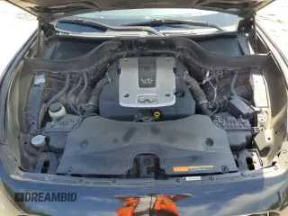 2009 Infiniti FX z VIN JNRAS18W79M153932, wystawiony jako Copart lot #52904095 z przebiegiem 170 407 mil mil oraz Szkoda całkowita • Salvage title. Historia ofert i sprzedaży dostępna na DreamBid. Obrazek 11.
