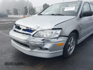 2002 Mitsubishi Lancer OZ-Rally with VIN JA3AJ86E92U038601, listed as a IAAI auction lot 41025991 with 162,450 mi miles. Bid and sale history available at carsss.com. Image 6.