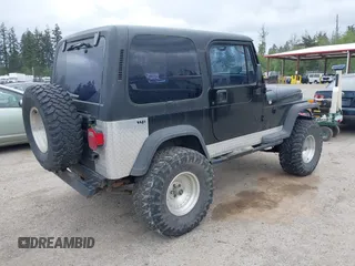 1994 Jeep Wrangler z VIN 1J4FY29S7RP474769, wystawiony jako IAAI lot #42283575 z przebiegiem 154 422 mil mil oraz . Historia ofert i sprzedaży dostępna na DreamBid. Obrazek 4.