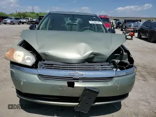 2005 Chevrolet Malibu Maxx LS z VIN 1G1ZT62855F304930, wystawiony jako Copart lot #57396145 z przebiegiem 135 949 mil mil oraz Szkoda całkowita • Salvage title. Historia ofert i sprzedaży dostępna na DreamBid. Obrazek 13.