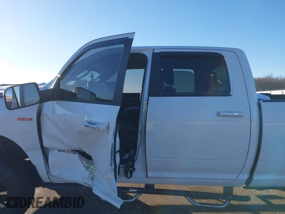 2019 Ram 2500 Big Horn with VIN 3C6UR5DJ3KG605871, listed as a IAAI auction lot 41292336 with 104,270 mi miles and . Bid and sale history available at DreamBid. Image 14.
