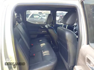 2020 Toyota Tacoma SR5 with VIN 3TMAZ5CN7LM138859, listed as a IAAI auction lot 42150725 with 36,462 mi miles and . Bid and sale history available at DreamBid. Image 8.