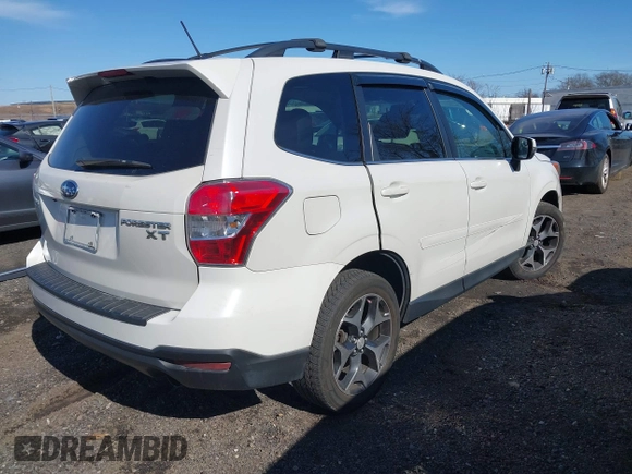 2014 Subaru Forester XT Touring with VIN JF2SJGMC4EH534647, listed as a IAAI auction lot 41828950 with 106,375 mi miles and . Bid and sale history available at DreamBid. Image 4.